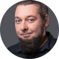 Man with a beard in black shirt