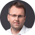 Dark haired man with glasses